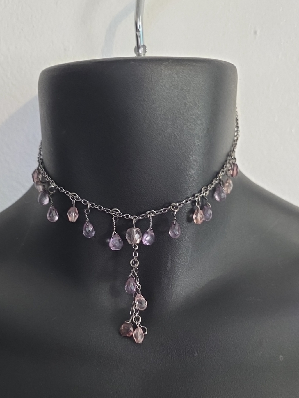 vintage purple amethyst lariat drop necklace featuring a dark chain.